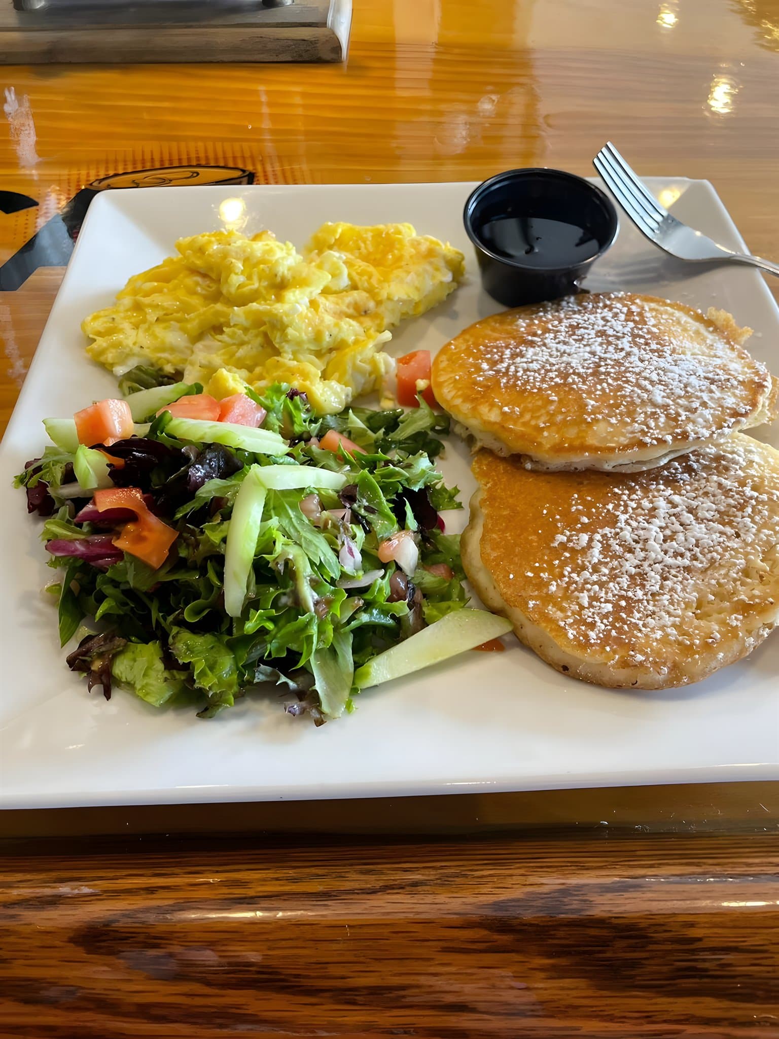 Pancakes, eggs and a side salad from the brunch menu