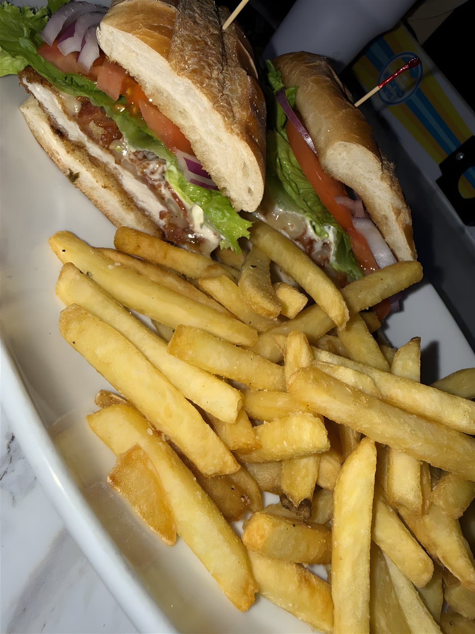 Chicken club sandwich with friez