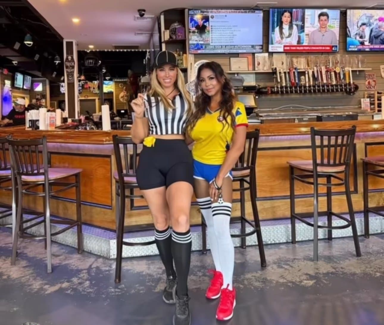 The Canz bar on game day, with draft taps, high-top stools and TVs above